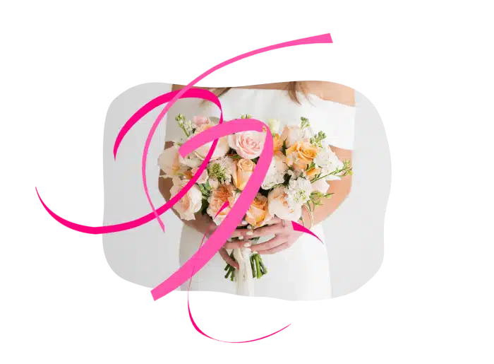 Image of lady in white dress holding flowers 